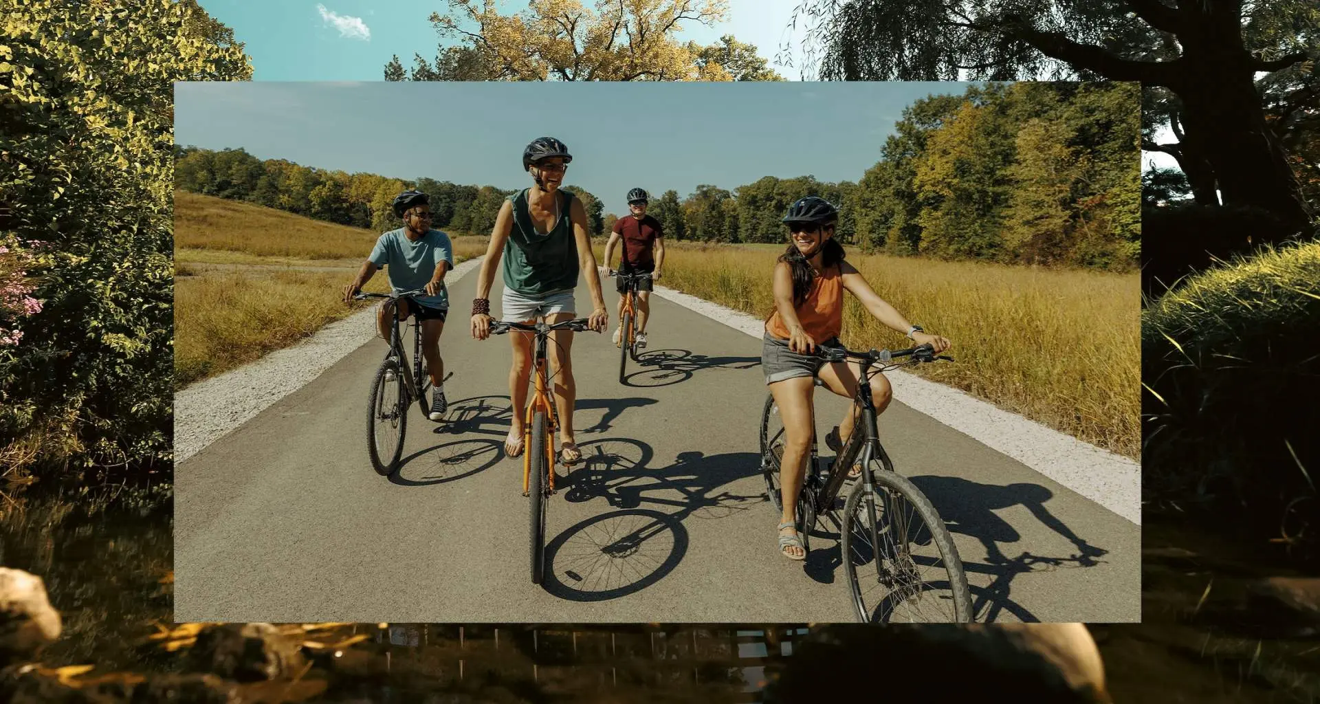 A group of people biking along a road