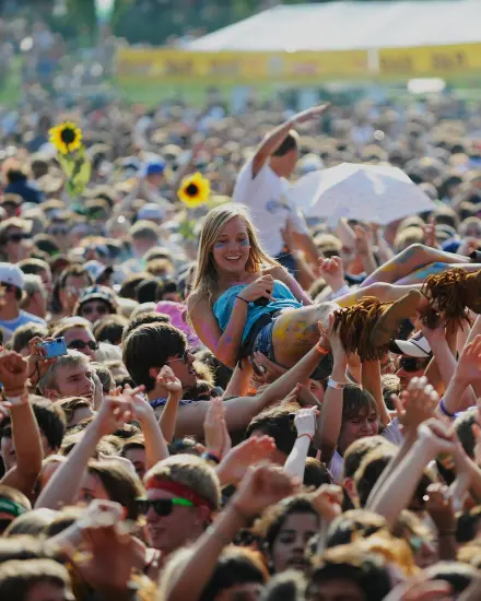 Person crowd surfing