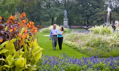 Couple walking in garden